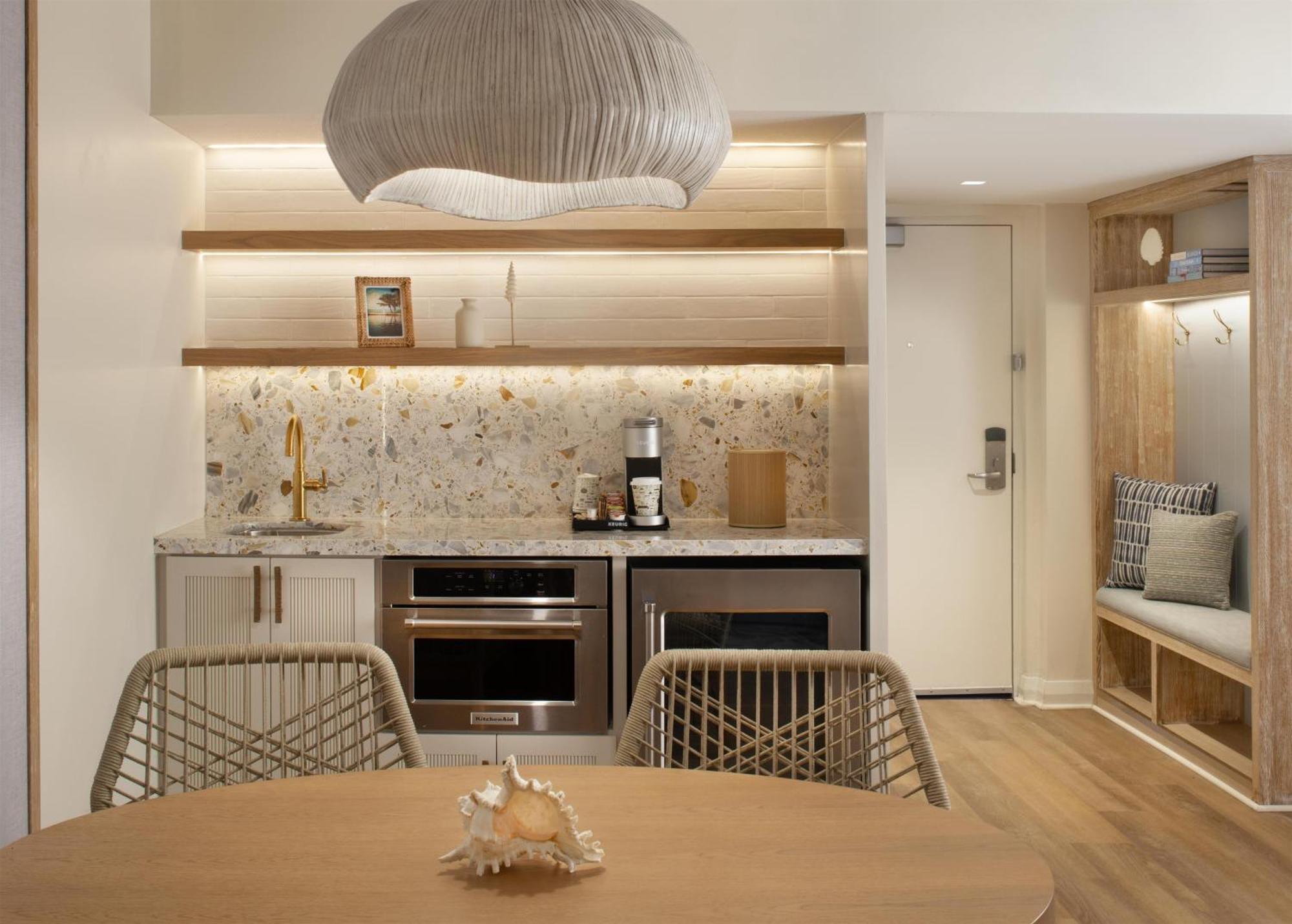 One-Bedroom Palm Suite Kitchenette Partial Waterfront View
